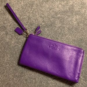 Large purple coach wristlet *USED ONCE, LIKE NEW*